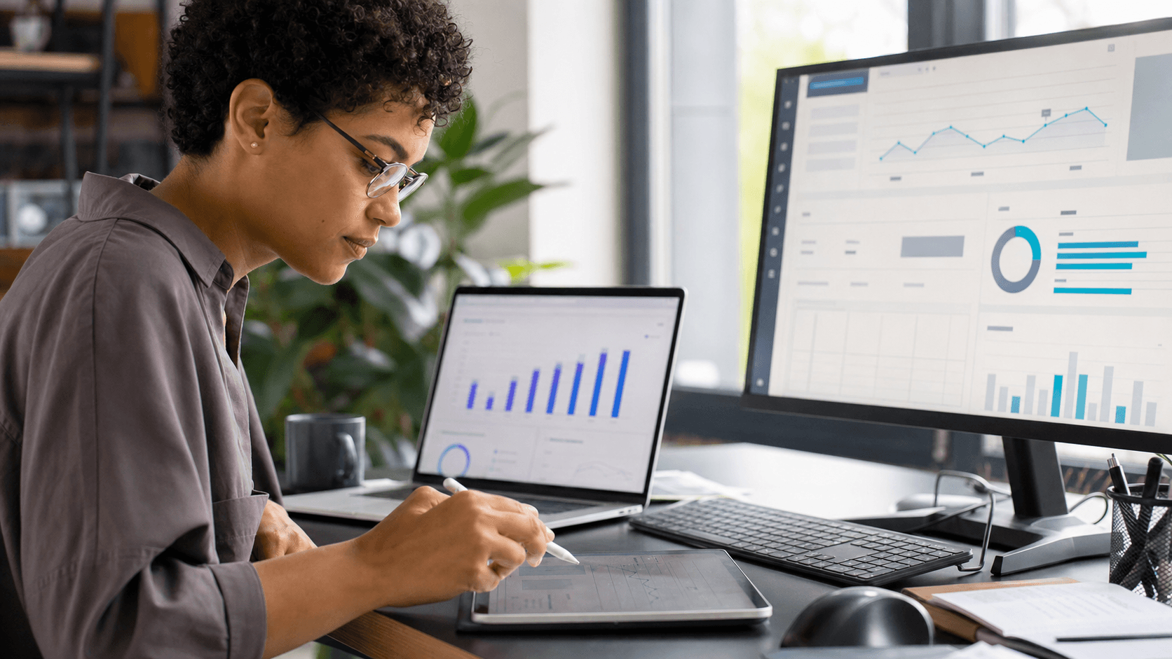 Hero image of a performance marketer comparing Meta Ads conversion charts with ecommerce order totals to diagnose purchase tracking mismatches.